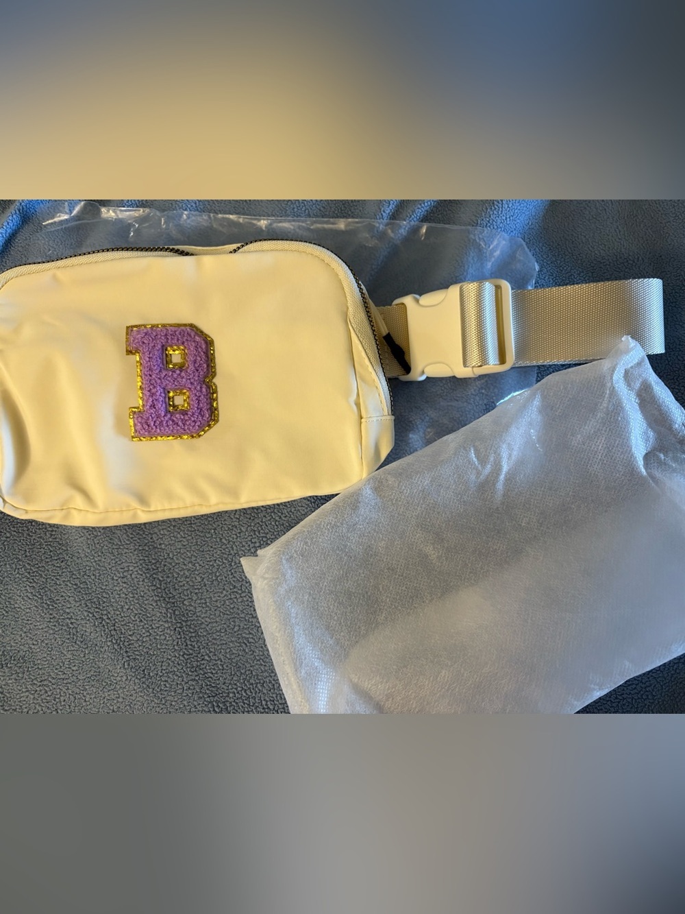 NIB- Unique Cream Crossbody Belt Bag with Purple 'B' Patch with dust bag